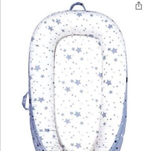 Brand new never used mambaby star co sleeper.